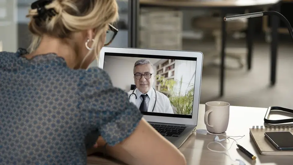 Patient meeting a healthcare professional through a secure telehealth visit